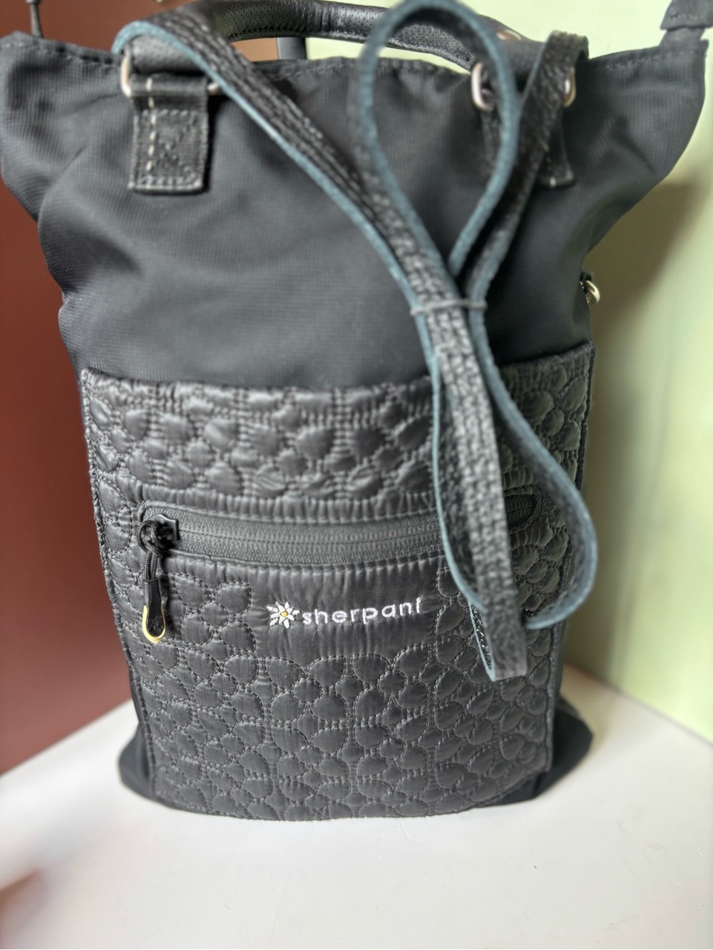 SHERPANI Black Quilted Drawstring Crossbody Tote with Front Zip Pocket